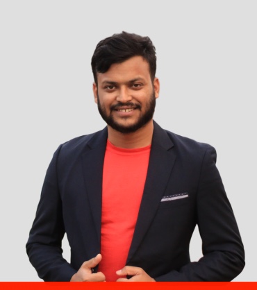 Nasim Reza in a black blazer and red t-shirt